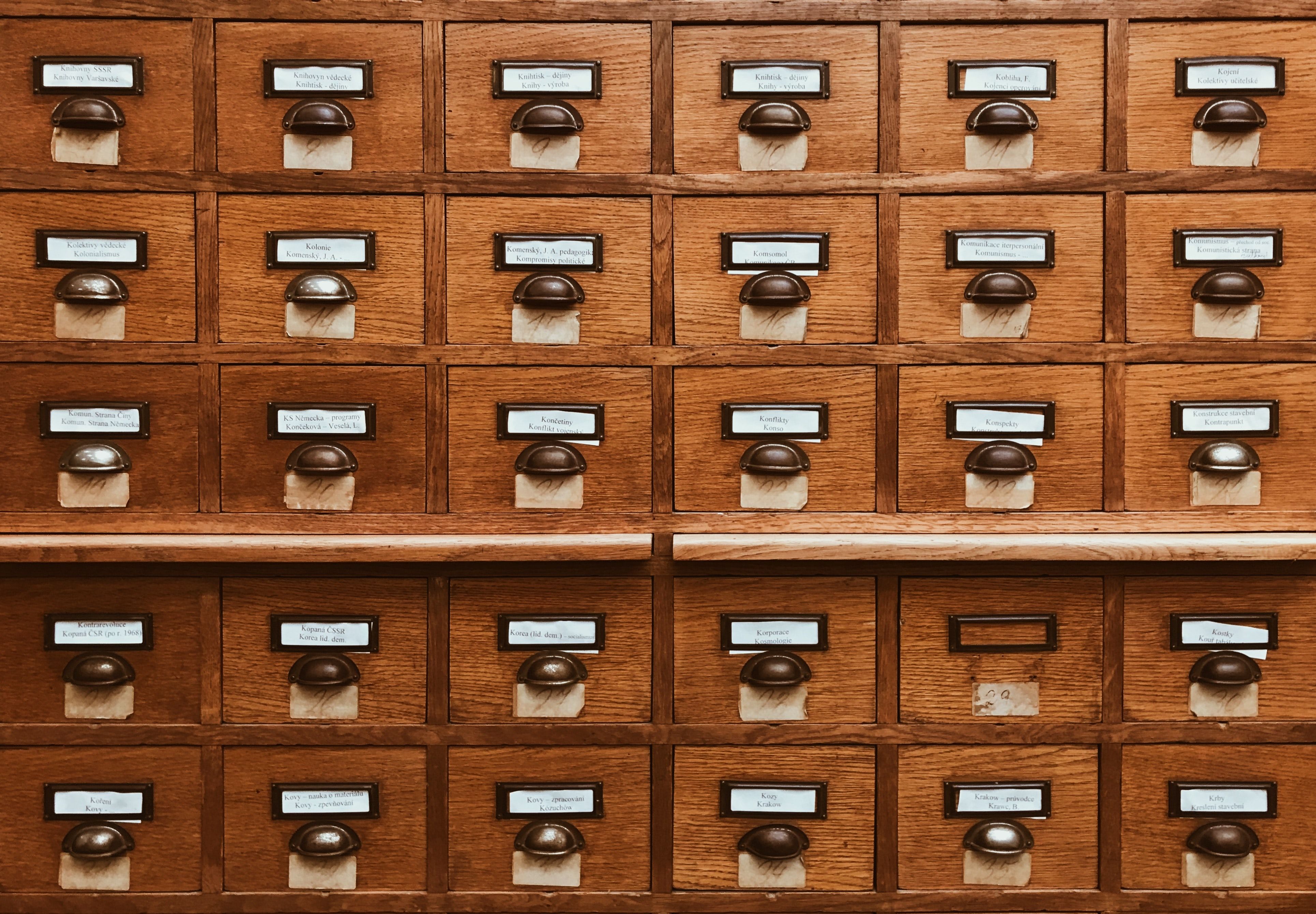 Photo of lots of small wooden file cabinets