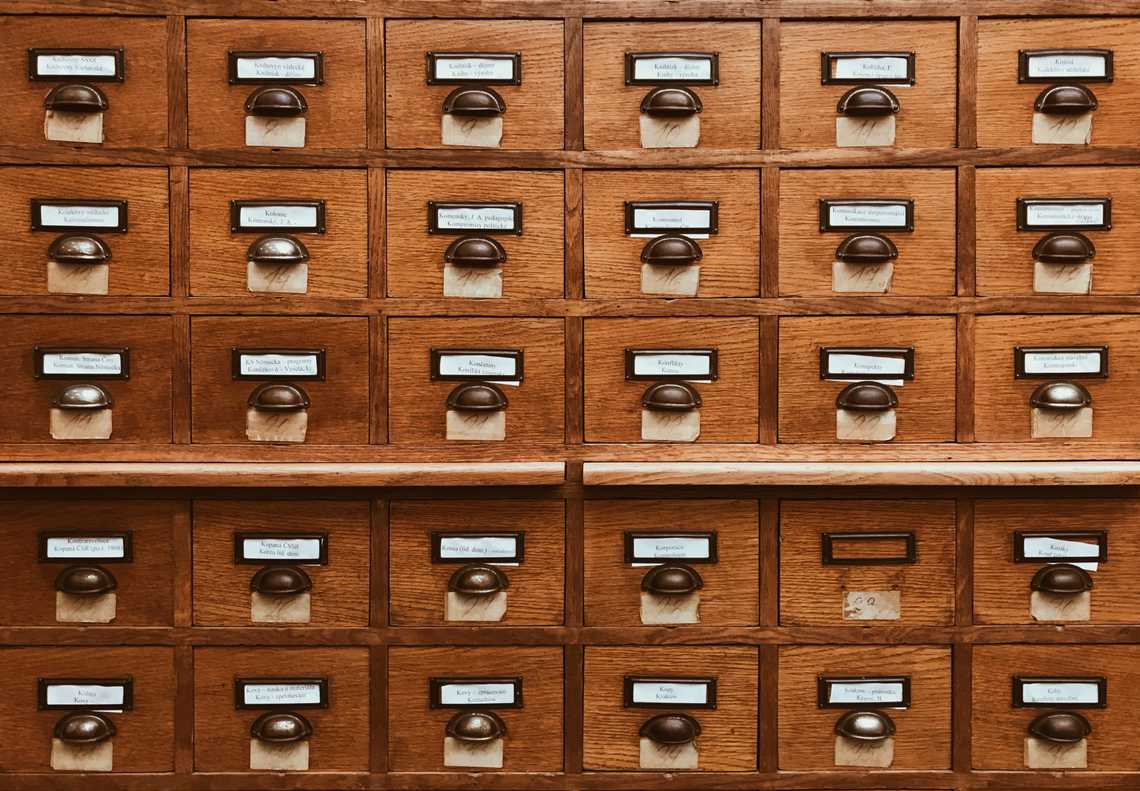 Photo of lots of small wooden file cabinets